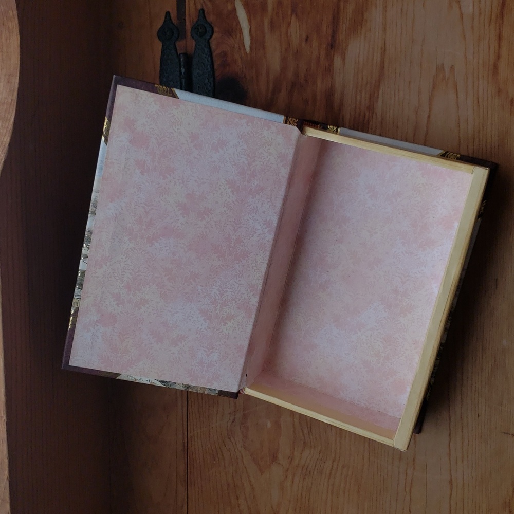 Elegant Gold and Cream Coffee Table Book with Hidden Compartment - Picture 9 of 13